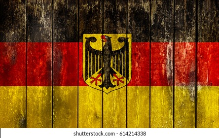 Flag of Germany painted on grungy wood plank background