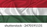 Flag of Hungary waving in the wind on silk texture