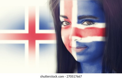 The flag of Iceland on the face of a smiling woman. / Color effects and custom white balance is added to this photo.