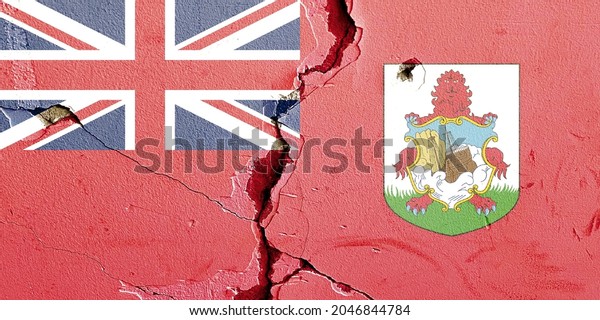 The flag icon of the British Overseas Territory
of Bermuda grunge pattern painted on old weathered broken wall
background, abstract Bermuda politics economy society issues
concept texture wallpaper