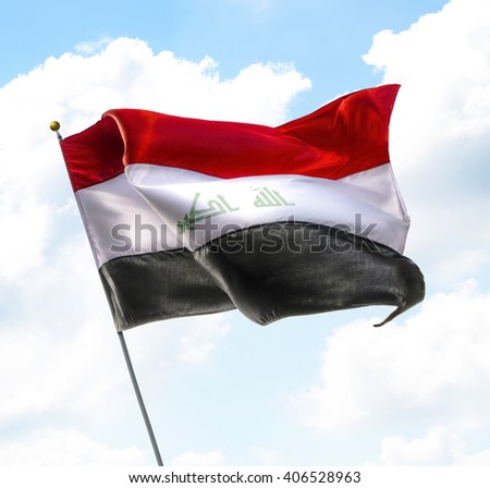 Flag of Iraq Raised Up in The Sky
