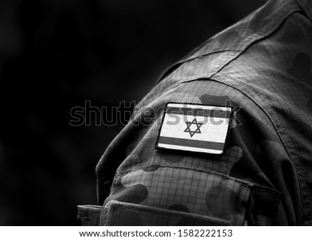 Flag of Israel on military uniform. Black and white. (collage).