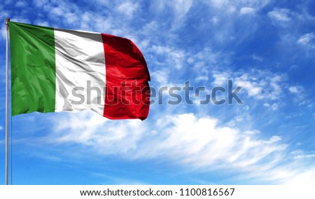 Flag of Italy on flagpole against the blue sky