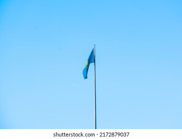 Flag Of Kazakhstan Against The Blue Sky In Calm Weather. June 28, 2022 Almaty Kazakhstan.