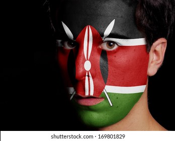 Flag Of Kenya Painted On A Face Of A Young Man