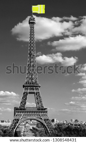 flag like a jackets symbol of Yellow vests movement on Eiffel Tower in Paris seen from the Trocadero in black and White effect