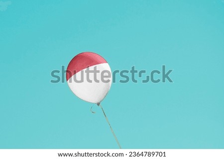 Flag of Monaco flags Ballon on Blue Sky. Monaco Flag painted on Ballon for politics, economy, election.
