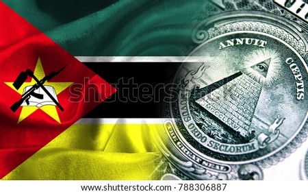 Flag of Mozambique on a fabric with an American dollar close-up.