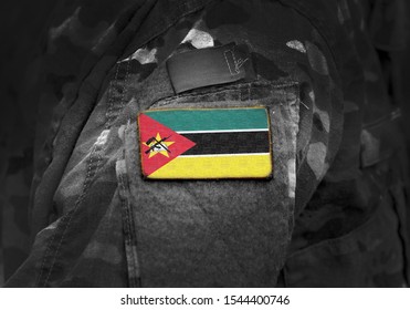 Flag Of Mozambique  On Military Uniform. Army, Troops, Soldiers. Collage.