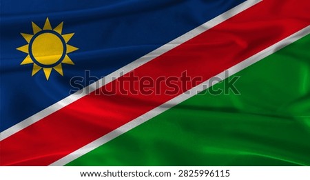 Flag of Namibia with fabric textured background. Close up of National flag of Namibia with realistic texture