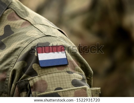 Flag of Netherlands on military uniform (collage).