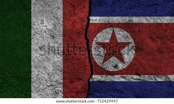 Flag of the and North korea painted\
on wall divided with crack ,conflict - relations\
concept