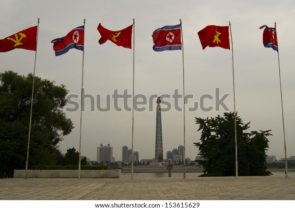 Flag of North\
Korea and flag of the Workers\' Party of Korea. The center of\
Pyongyang - the capital of North\
Korea.
