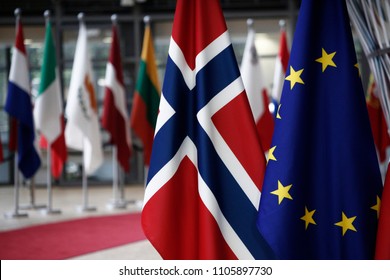 The Flag Of Norway And Flag Of Europe Stands In EU Council Building In Brussels, Belgium On June 5, 2018.
