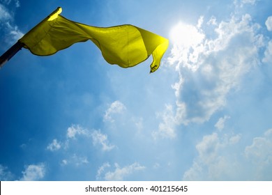  flag on a background of the dark blue sky with clouds.