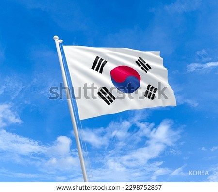 Flag on Korea flag pole and blue sky, Flag of Korea fluttering in blue sky big national symbol. Waving red blue and white black symbol Korea flag, Independence Constitution Day.