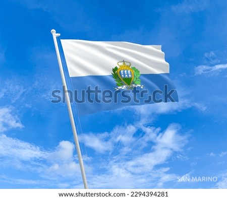 Flag on San-Marino flag pole and blue sky, Flag of San-Marino fluttering in blue sky big national symbol. Waving blue and white San-Marino flag, Independence Constitution Day.