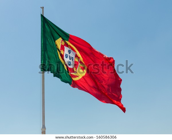 The Flag of Portugal or Bandeira de Portugal is the\
national flag of the Portuguese Republic. It is a rectangular\
bicolour with a field unevenly divided into green on the hoist, and\
red on the fly.