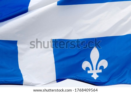 The flag of Quebec in the wind