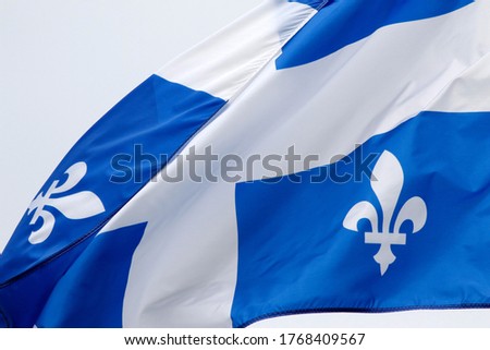 The flag of Quebec in the wind