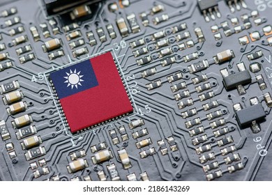 Flag of the Republic of China or Taiwan on a processor, CPU Central processing Unit or GPU microchip on a motherboard. Taiwan manufacturing chip industry emerges as battlefront in US - China showdown. - Shutterstock ID 2186143269