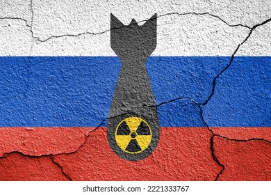 Flag Of Russia Painted On A Concrete Wall With Nuclear Weapon Sign. Russian Military Aggression