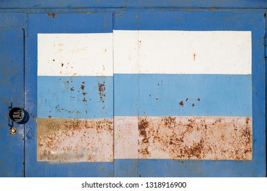 Flag Of Russia, Painted On Old Rusty Gate. The Concept Can Symbolize The Iron Curtain Between Countries. Perfect For Background And Grunge Design.