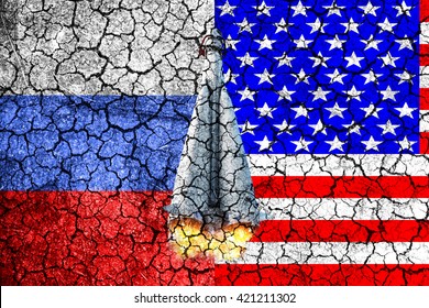 Flag Of Russia And USA Painted On The Cracked Wall. Concept Of War. Cold War. The Arms Race. Nuclear War. The Third World War. The Conflict Between Russia And America. Political Concept. Front View.