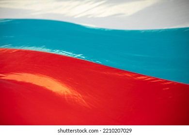 Flag Of Russia In Waves. Vibration Of Fabric In Wind. Colors Of National Flag. White Stripe, Blue And Red.