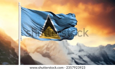Flag of Saint Lucia on a flagpole against a colorful sky
