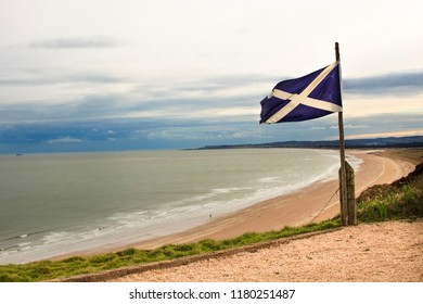 Flag Of Scotland On The Sea Background. St Cyrus Beach, Angus, Aberdeenshire, Scotland, UK