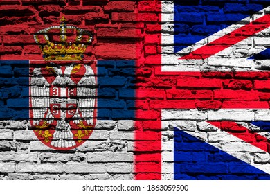 Flag Of Serbia And United Kingdom On Brick Wall