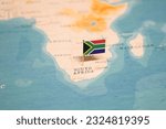 The Flag of South Africa on the World Map.