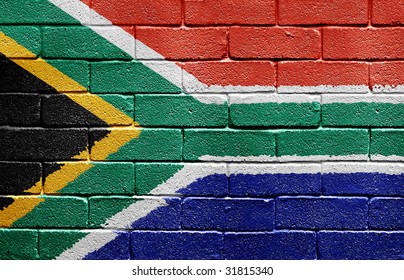 Flag of South Africa painted onto a grunge brick wall