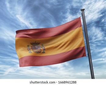 Flag Of Spain On Flag Pole In Blue Sky. Spain Flag For Advertising, Celebration, Achievement, Festival, Election. The Symbol Of The State On Wavy Cotton Fabric.