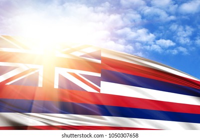 Flag Of State Of Hawai I Against The Blue Sky With Sun Rays