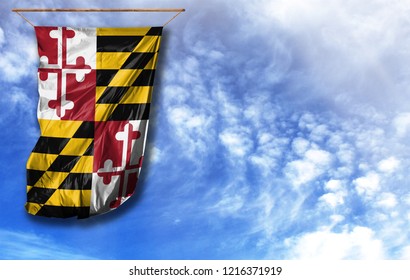 Flag State Of Maryland . Vertical Flag, Against Blue Sky With Place For Your Text