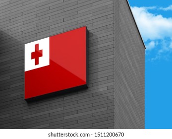 Flag Of Tonga On Signage Board. Tonga Flag On Building Signage Board.