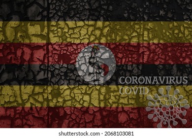 Flag Of Uganda On A Old Vintage Metal Rusty Cracked Wall With Text Coronavirus, Covid, And Virus Picture.