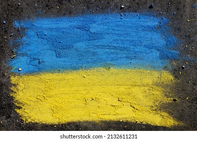 Flag of Ukraine. Chalk drawing on sidewalk. Creative support by children for Ukraine 