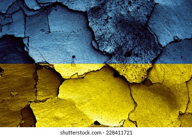 flag of Ukraine painted on cracked wall - Shutterstock ID 228411721