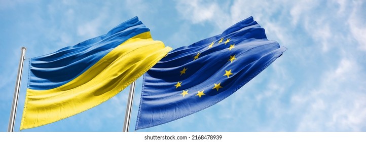 flag ukraineflag ukraine and european union ukraine candidate in european union The European Commission supported granting Ukraine the status of an EU candidate. - Shutterstock ID 2168478939