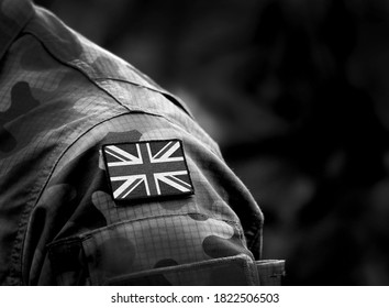 Flag of United Kingdom on military uniform. UK Army. British Armed Forces. Remembrance Day. Poppy day. Empty space for text. Collage - Shutterstock ID 1822506503