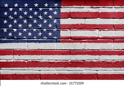 Flag of the United States of America painted onto a grunge brick wall