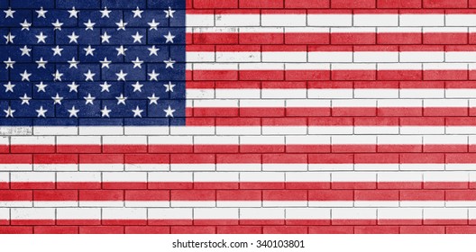 Flag of united states of america painted over on old brick wall.