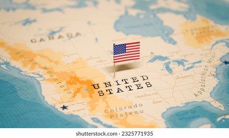 The Flag of United States on the World Map.