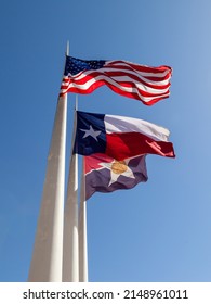 
Flag Of The United States, Flag Of Texas And Flag Of Dallas Waving In The Wind With Blue Sky Background At City Hall Plaza In Dallas, TX, USA. 
