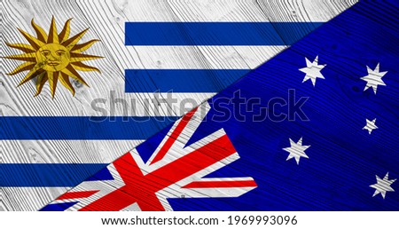 Flag of Uruguay and Australia on wooden planks