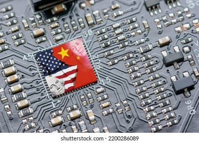 Flag of USA and China on a processor, CPU or GPU microchip on a motherboard. US companies have become the latest collateral damage in US - China tech war. US limits, restricts AI chips sales to China. - Shutterstock ID 2200286089