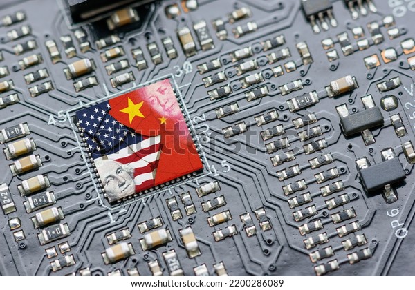 Flag of USA and China on a processor, CPU or GPU\
microchip on a motherboard. US companies have become the latest\
collateral damage in US - China tech war. US limits, restricts AI\
chips sales to China.